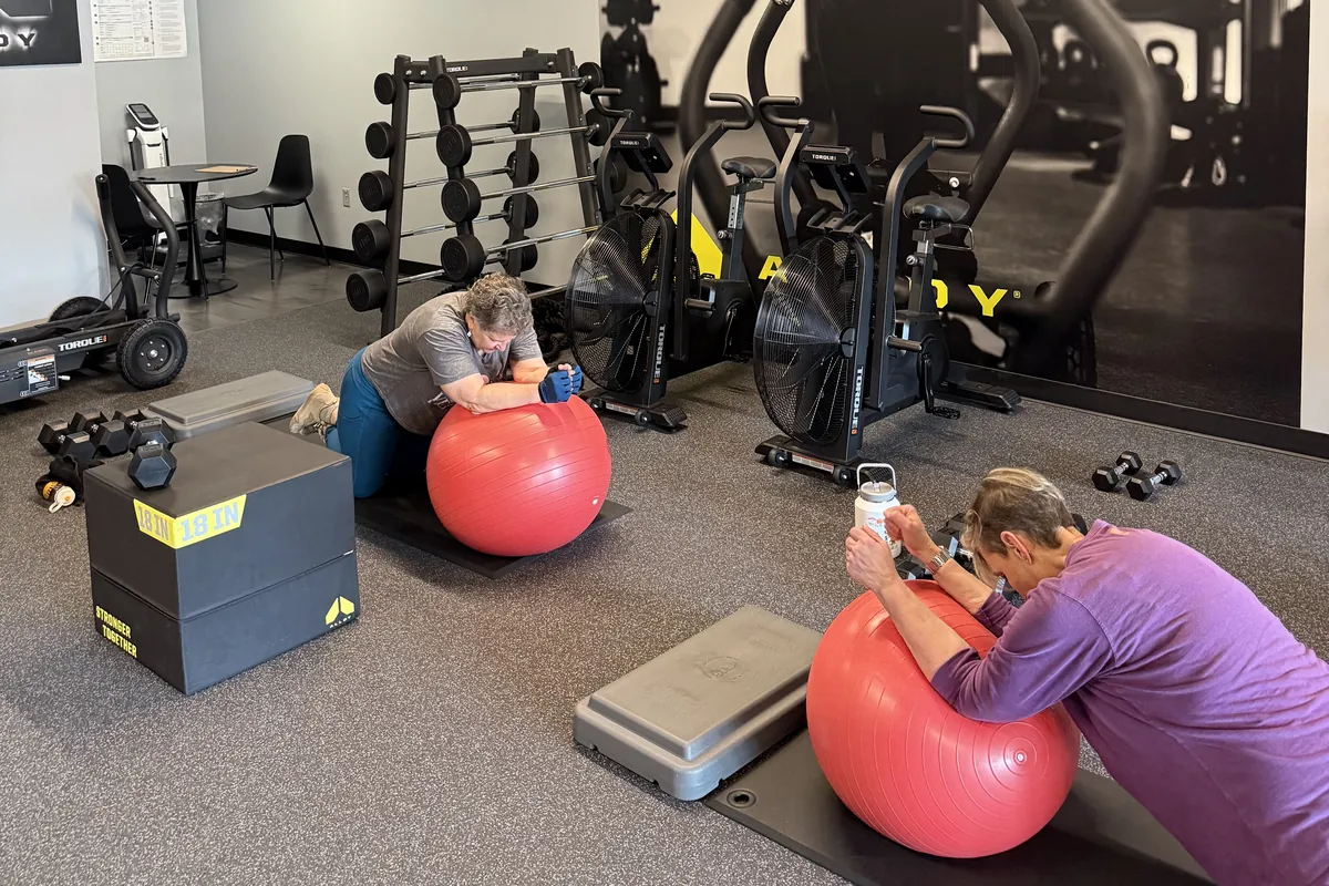 Members training on stability balls at Alloy Personal Training Fairfax City